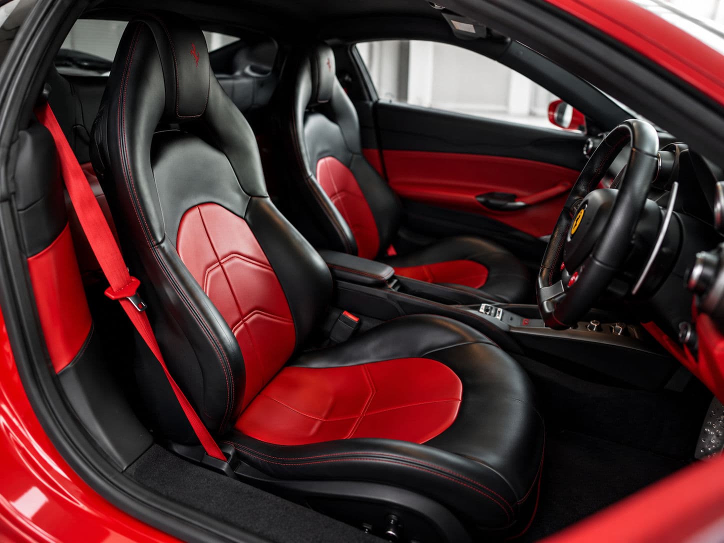 488 GTB: Ferrari 488 GTB interior with black and red leather sport seats and right-hand drive — RC24.