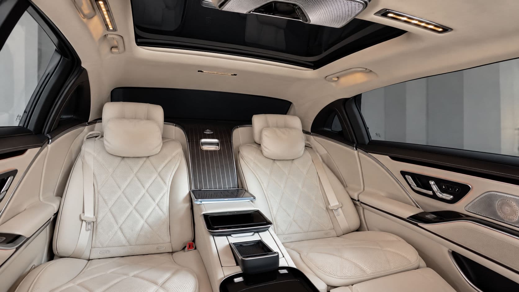 S 680: Mercedes-Maybach S 680 2025 two Executive rear seats in cream quilted leather with headrest pillows and a wooden centre console between them